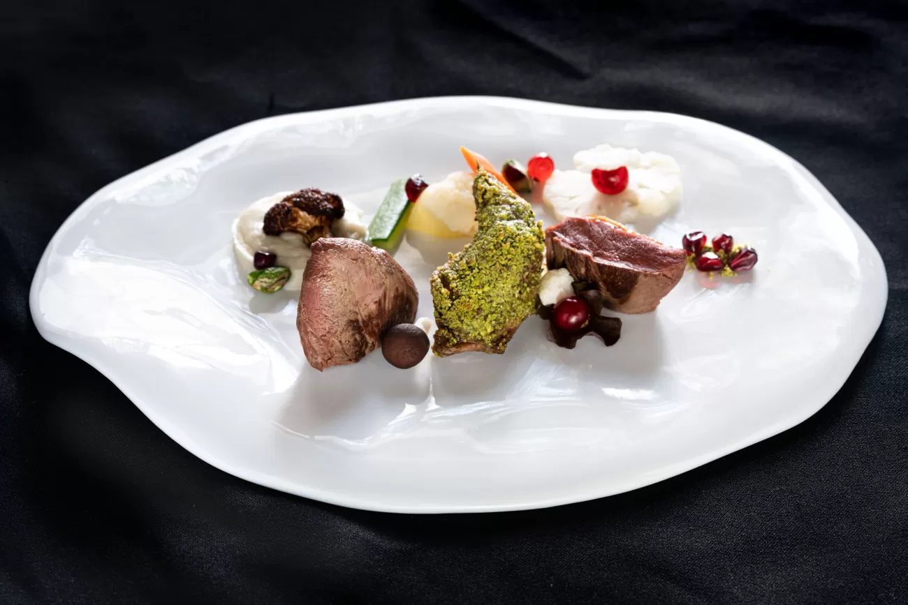 Petto di piccione in tre cotture – piatto gourmet con presentazione raffinata